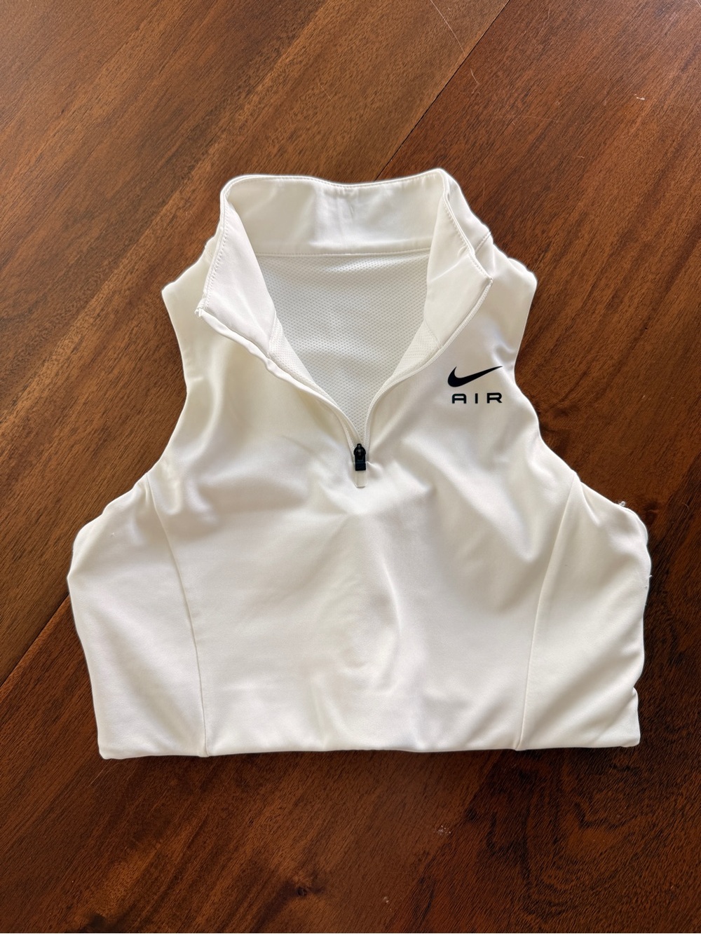 Nike Women’s White Sleeveless Zip-Front Longline Sports bra